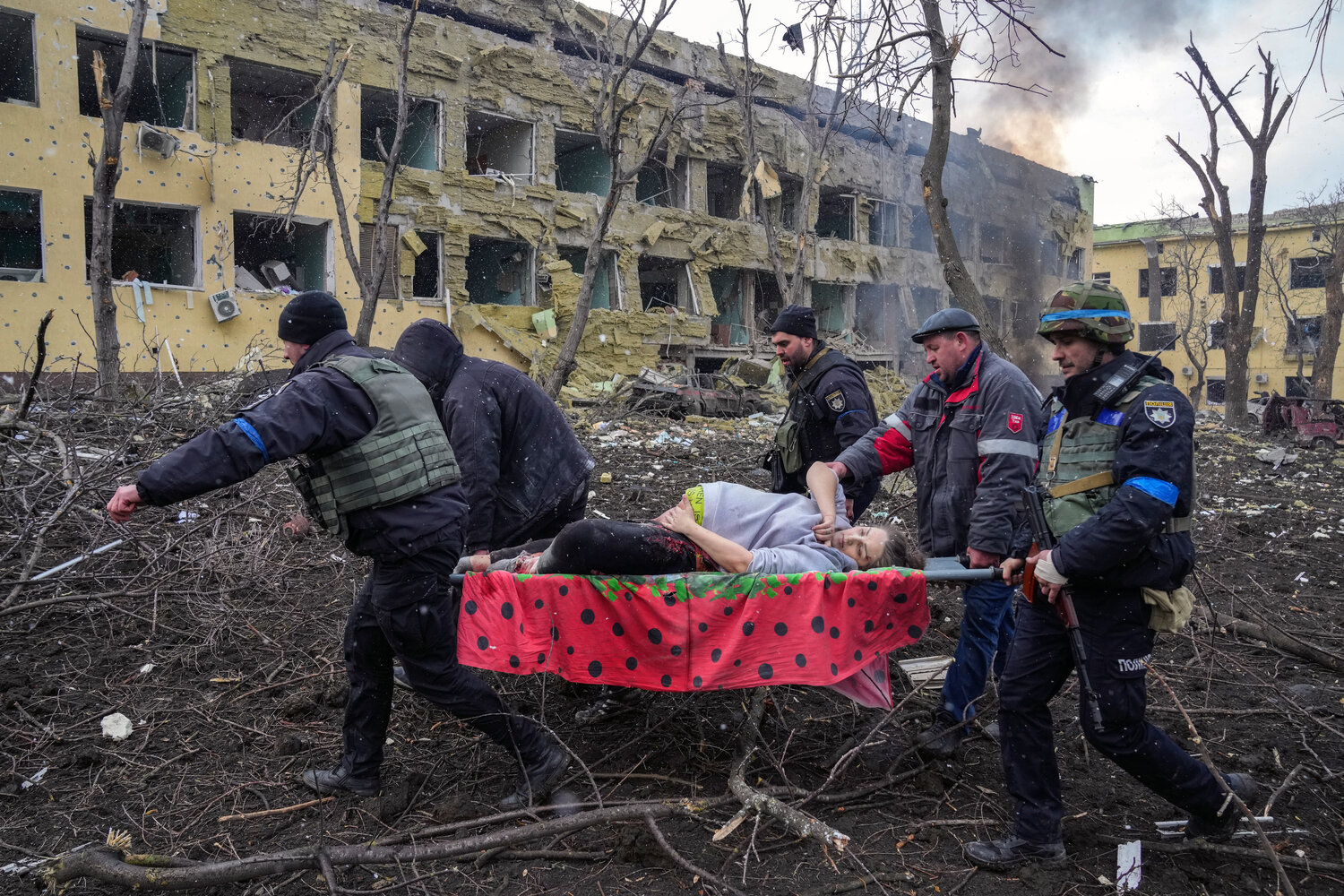 The AP won last year’s Pulitzer Prize for public service, for reporting from Mariupol, Ukraine, including this image of a pregnant woman being evacuated from a maternity hospital that was damaged by a Russian airstrike. (Evgeniy Maloletka / AP, 2022)